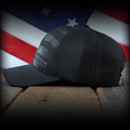 Load image into Gallery viewer, Blacked Out Debossed American Flag Trucker Hat