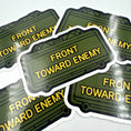 Load image into Gallery viewer, STICKER - The Clacker Claymore Mine - 'Front Toward Enemy' - 3" Sticker