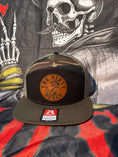 Load image into Gallery viewer, Black/Camo 7 Panel (brown leather patch)
