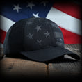 Load image into Gallery viewer, Blacked Out Debossed American Flag Trucker Hat
