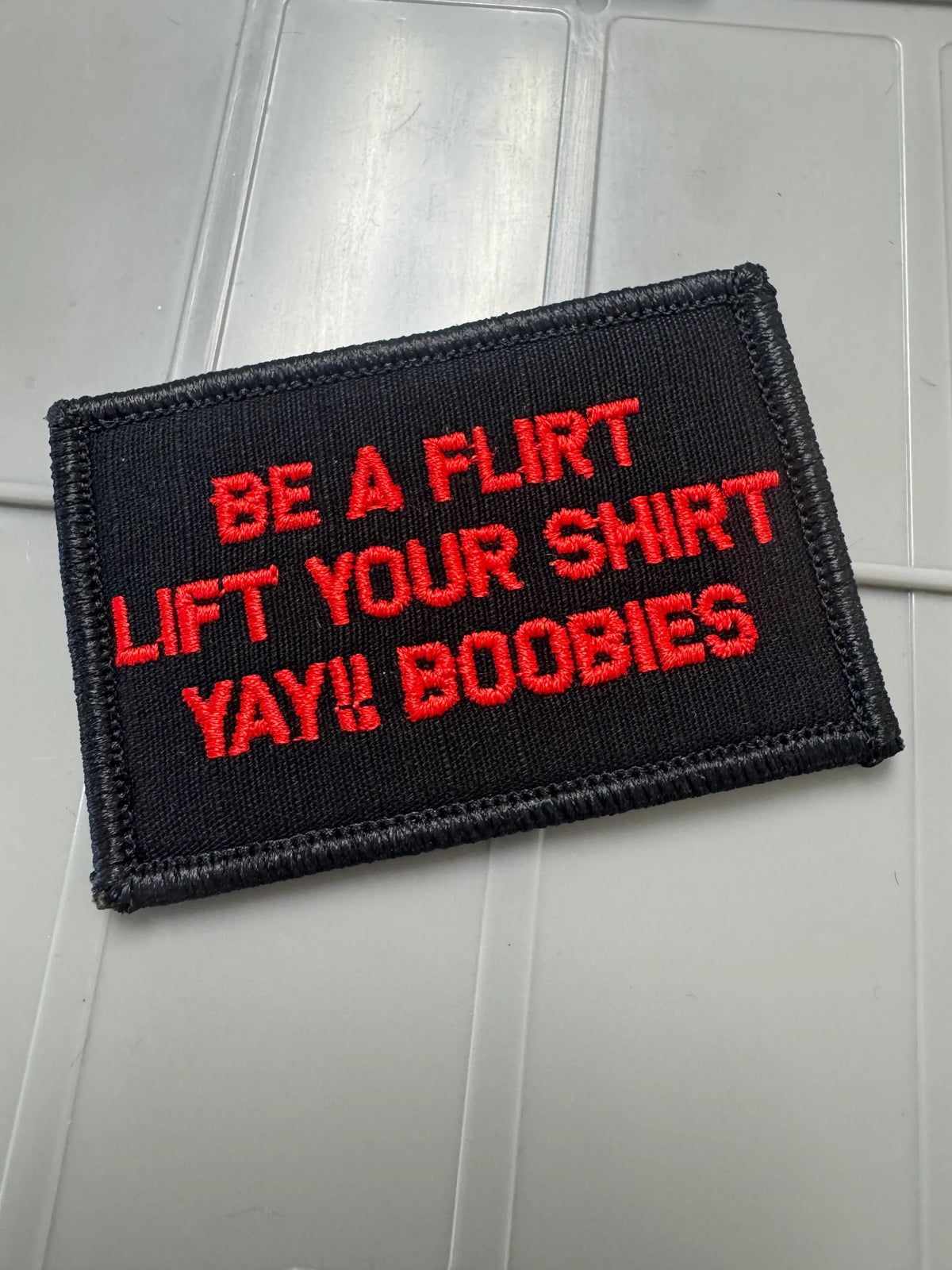 As Seen on Socials - Be A Flirt Lift Your Shirt Yay!! Boobies  - 2x3 Patch - Black w/Red