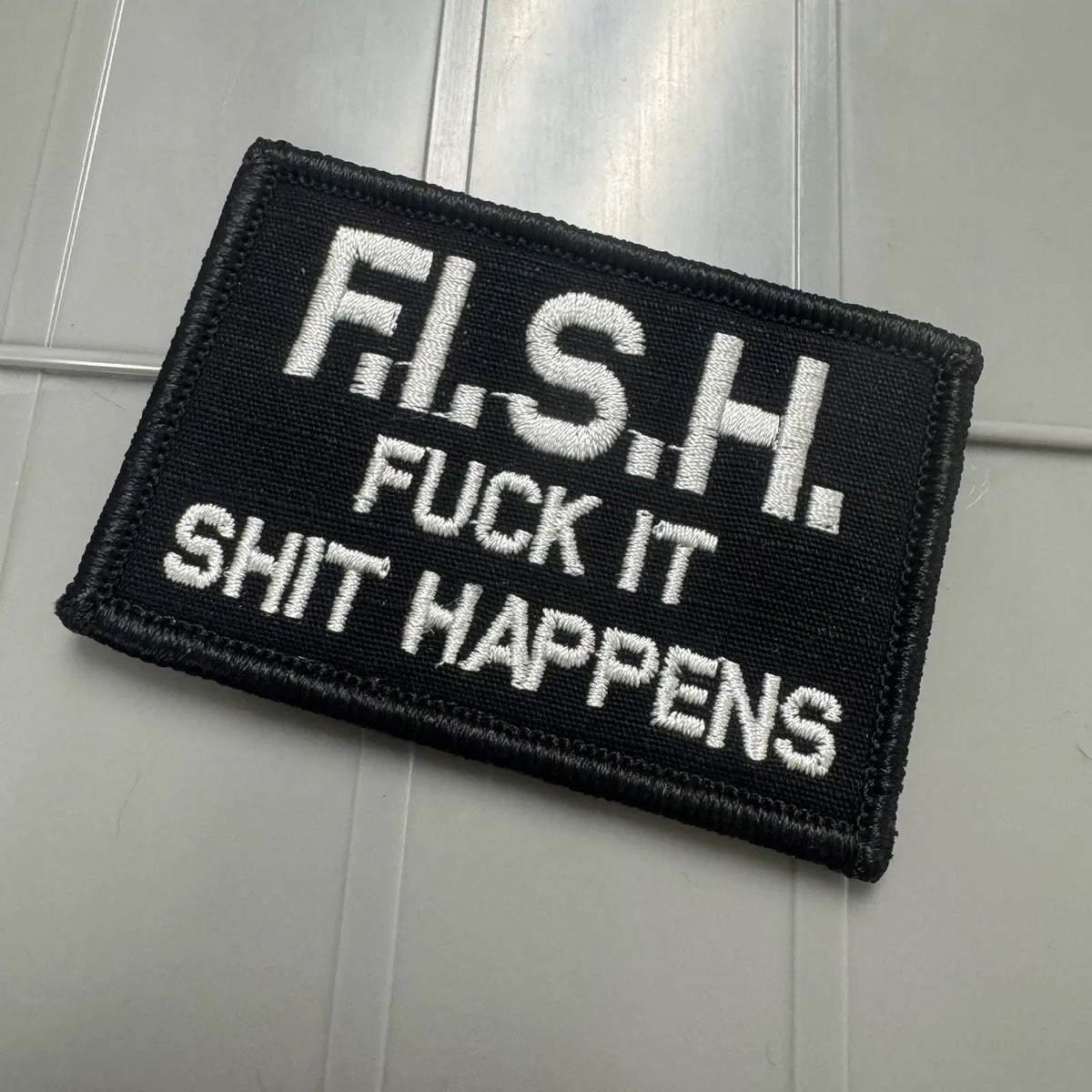As Seen on Socials -F.I.S.H. - Fuck It Shit Happens - 2x3 Patch - Black w/Silver