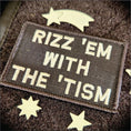 Load image into Gallery viewer, Rizz 'Em With The 'Tism Playful Unique Gen Z Style Embroidered Patch - 2x3 inches
